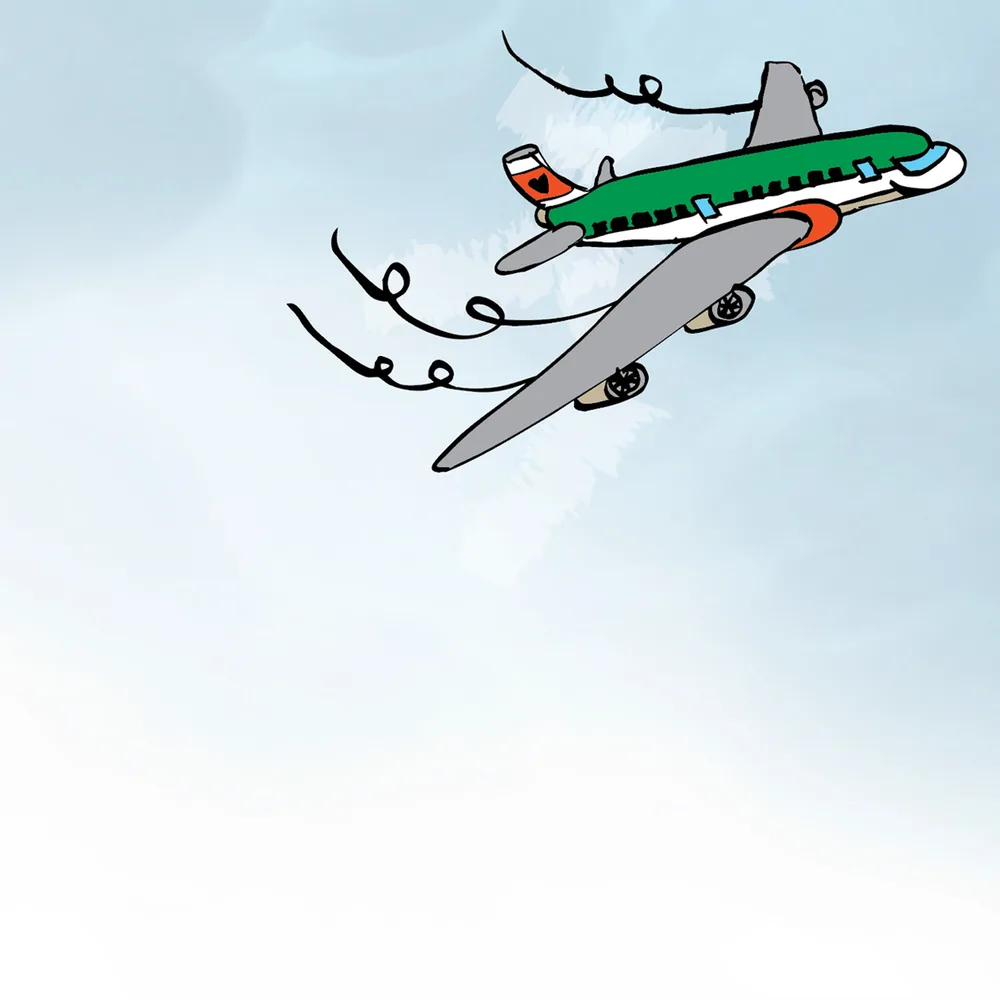 Spread: a green aeroplane loops through a pale sky.